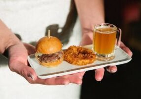 Burger, onion ring, and small beer | Lisa Dupar Catering | Wedding & Event Catering in Seattle